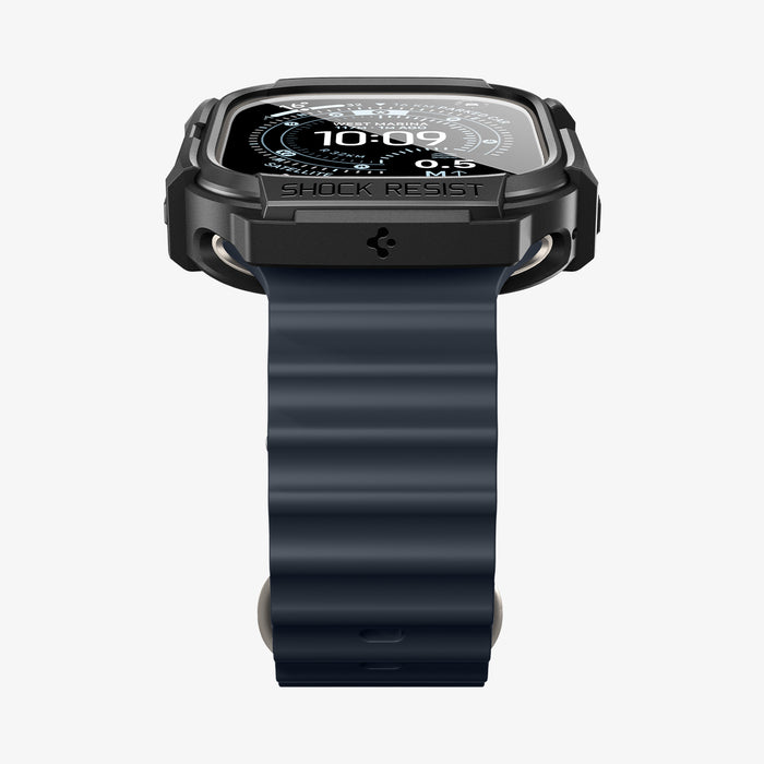 ACS11414 - Front view of Spigen Rugged Armor case on Apple Watch Ultra showing Shock Resist bezel engraving and black Band