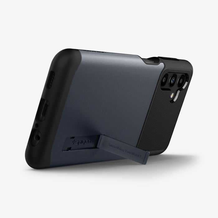 ACS04202 - Galaxy A13 5G Case Slim Armor in Metal Slate showing the back, partial side and bottom with a built-in kickstand propped up