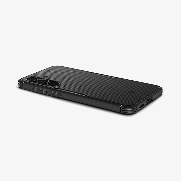 ACS11641 - Galaxy S25 FE Core Armor (MagFit) in Matte Black showing the back, partial bottom and partial side with side buttons on flat surface