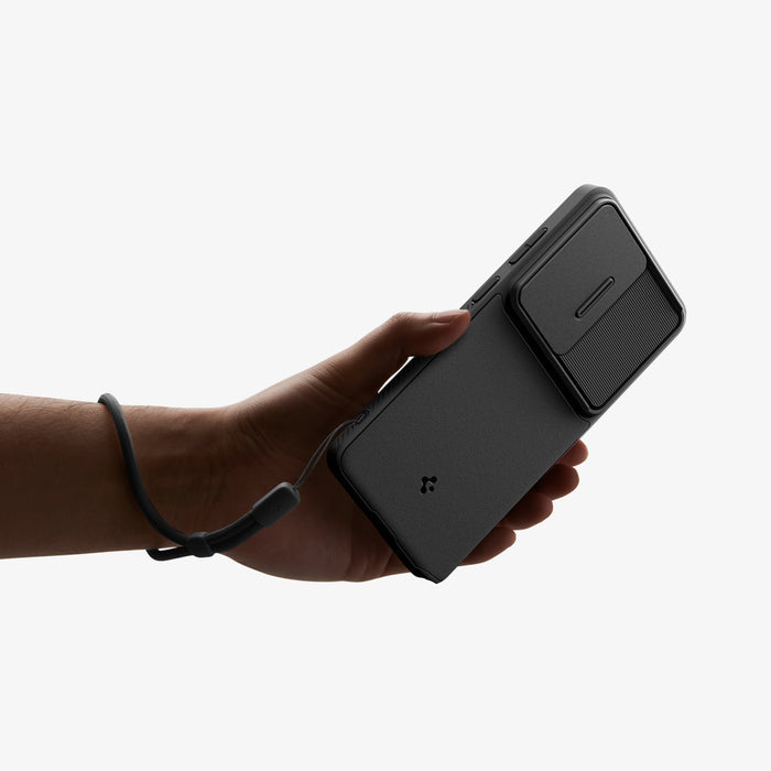 ACS11040 - Galaxy S26 Ultra Optik Armor in Black showing a hand with strap on with the device and case