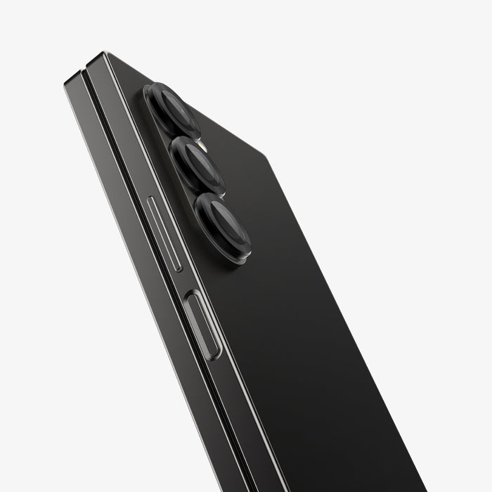 AGL07970 - Galaxy Z Fold 6 Optik Pro EZ Fit Lens Protector in Black showing the partial front and side of the lens camera installed on the camera lens, device showing partial back and sides