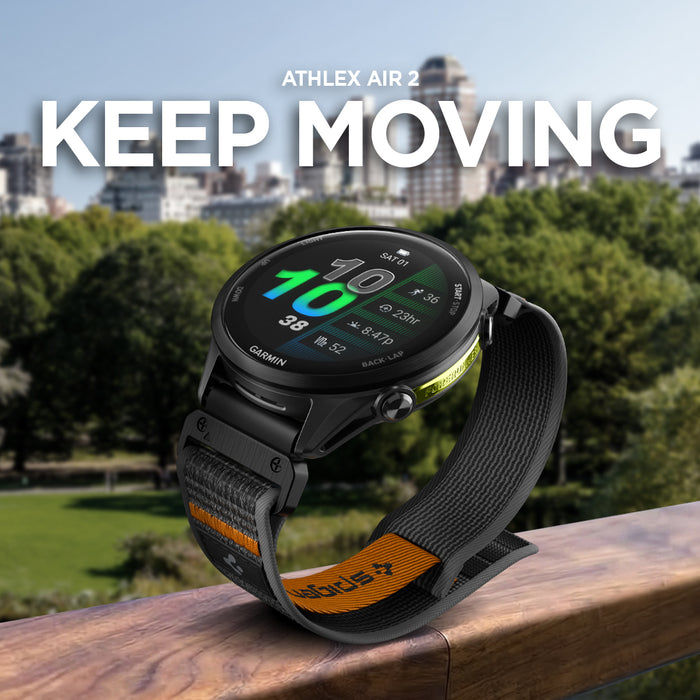 AMP11426 - Gamin 22mm Athlex Air Quick Fit showing smartwatch with Athlex Air 2 Quick Fit 22mm woven band in black and orange outdoors with keep moving graphic