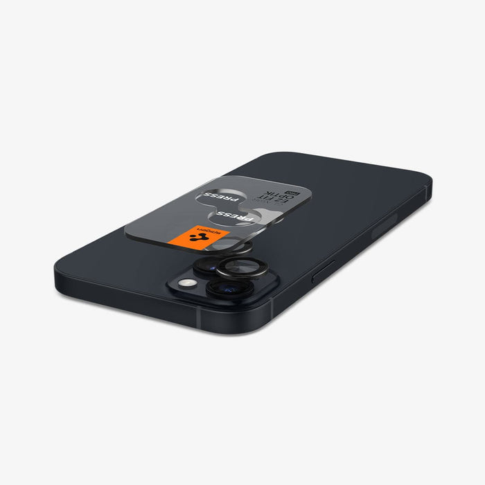 AGL05213 - iPhone 15 / 15 Plus Optik Pro Lens Protector in black showing the back with device laying flat and lens protector and ez fit tray hovering slightly above camera lens