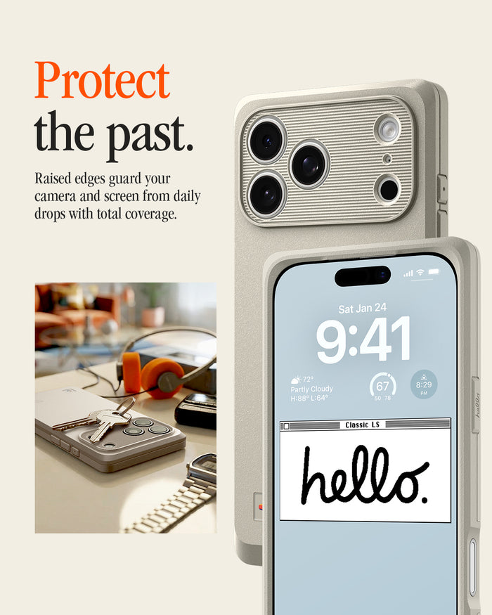 ACS10478 - iPhone 17 Pro Max Classic LS MagFit case showing the case's raised camera bezel and screen edge, with a lock screen reading "Classic LS hello." beside a desk scene.