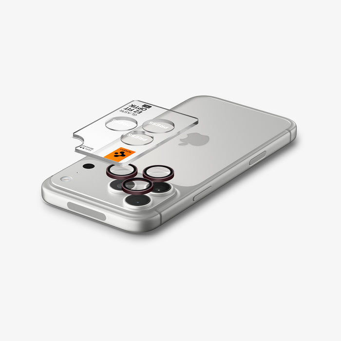 AGL12044 - iPhone 18 Pro Max / iPhone 18 Pro Optik Pro EZ Fit Lens Protector in burgundy showing three lens protectors aligned above the camera lenses before installation.