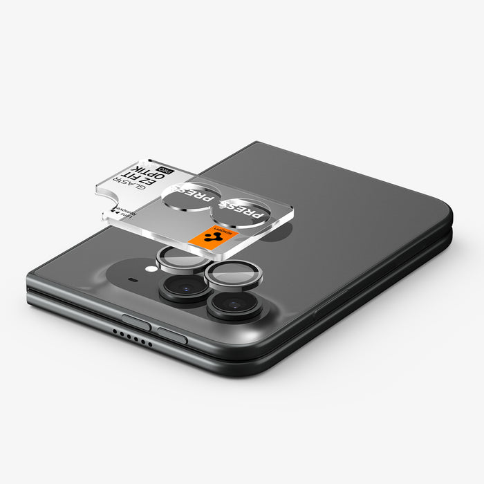 AGL12012 - iPhone Duo Optik Pro EZ Fit Lens Protector in Star White showing the EZ Fit Optik Pro tray aligned above the camera lenses for easy installation