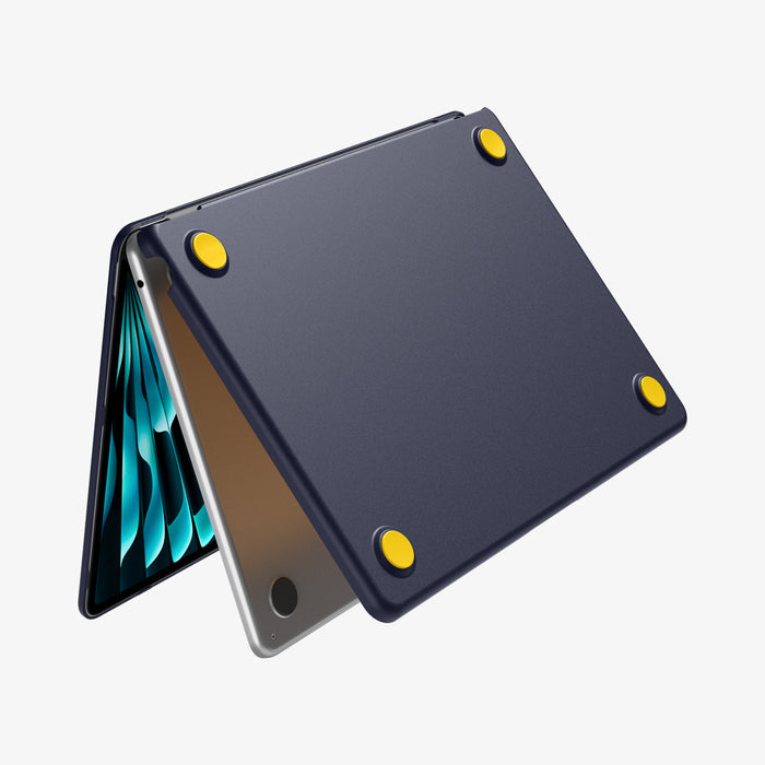 ACS11268 - MacBook Air 13-inch Nano Pop Blueberry Navy showing the bottom case with raised corner feet and ventilation openings