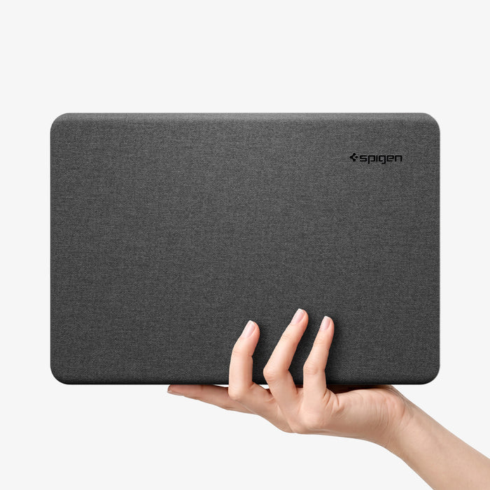 ACS11541 - MacBook Neo 13-inch Urban Fit in Black showing hand holding closed Urban Fit case in heather gray fabric
