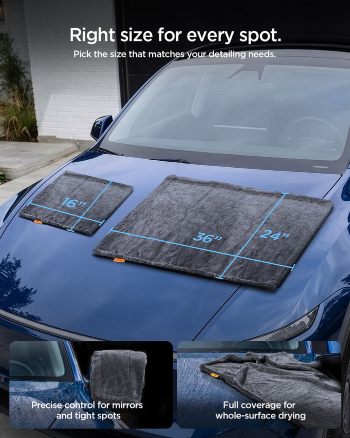 ACP11389 - Two sizes of Spigen microfiber towels, 16 inches and 36 by 24 inches, laid on a car hood to show size options for different detailing tasks