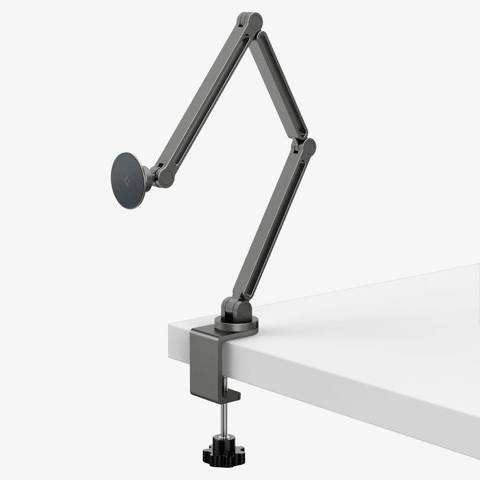 AMP09694 - Phone OneTap Clamp (MagFit) in Space Gray showing the front and side attached to the side of the table