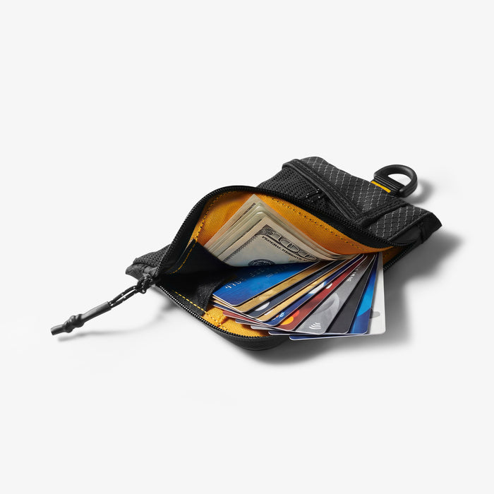 AFA11229 - Soft Card Holder | LF300 in Black showing open interior filled with multiple credit cards and folded cash bills against the yellow lining, with D-ring hook visible at top right.