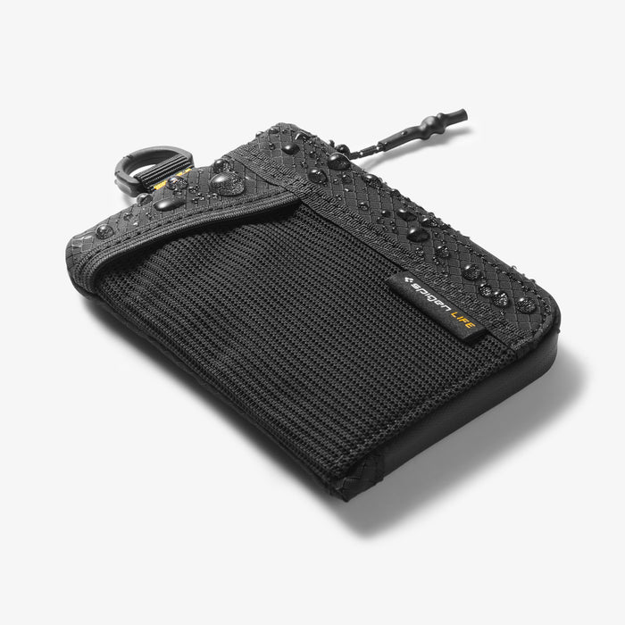 AFA11229 - Soft Card Holder | LF300 in Black showing angled front view with water droplets beading on the diamond-pattern ripstop fabric and mesh exterior, demonstrating water-resistant performance.