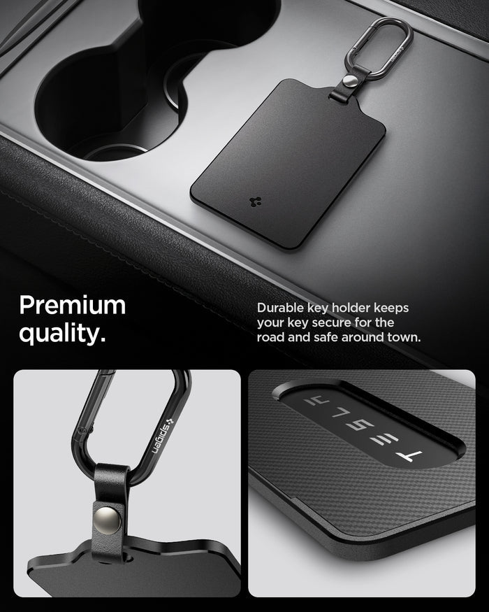 ACP07175 - Tesla key card holder with matte black finish and carabiner clip placed in Tesla center console showing premium build quality and close-up details of clip and card window