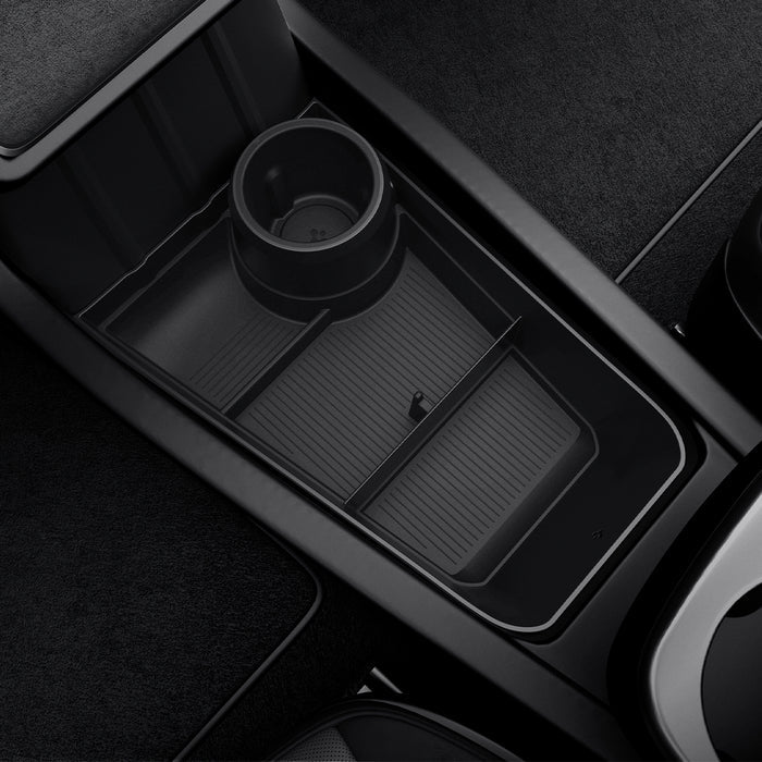 ACP11169 - Tesla Series - Center Console Organizer Lower Tray | TO220LYS in Black showing divided storage compartments with integrated cup holder and non-slip textured base installed in the center console.