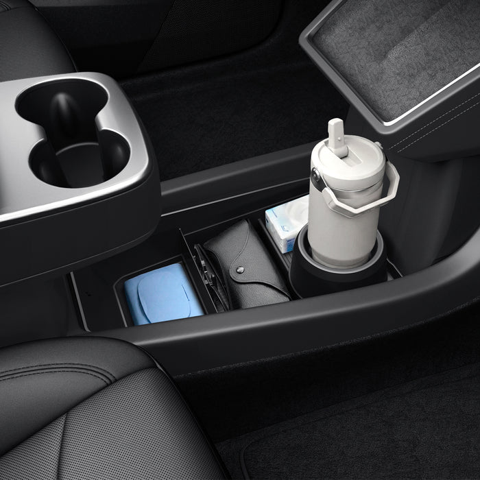 ACP11169 - Tesla Series - Center Console Organizer Lower Tray | TO220LYS in Black showing organized storage with water bottle in cup holder and compartments holding everyday items like wallet, wipes, and accessories.