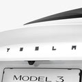ACP08549 - Tesla Model 3 Highland Rear Emblem Logo Cover TO322H in Black showing the front partial side