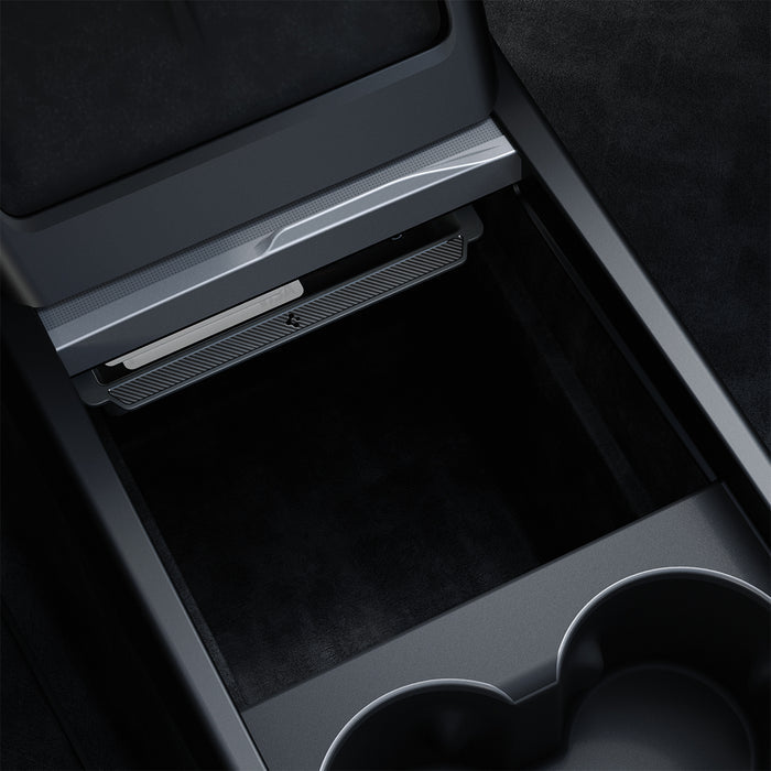 ACP07785 - Tesla Model 3 Highland Center Console Organizer Tray TO220SH in Black showing the partial edge of the tray inside a center console