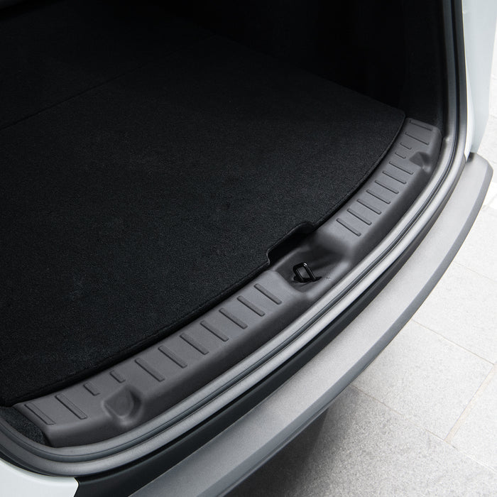 ACP09759 - Tesla Model Y Juniper Trunk Sill Guard | TG100-YJ in black showing the guard installed in trunk