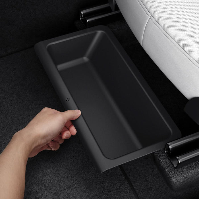 ACP10638 - Model Y Juniper (2025+) 1PK Underseat Organizer Box | TO222J showing a hand installing it inside of car