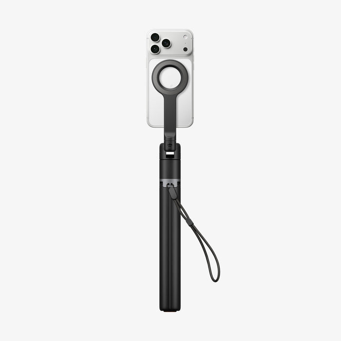 AMP11372 - Selfie Stick | S582W in Black showing a compact handheld form with mounted smartphone, magnetic ring holder, and attached wrist strap.