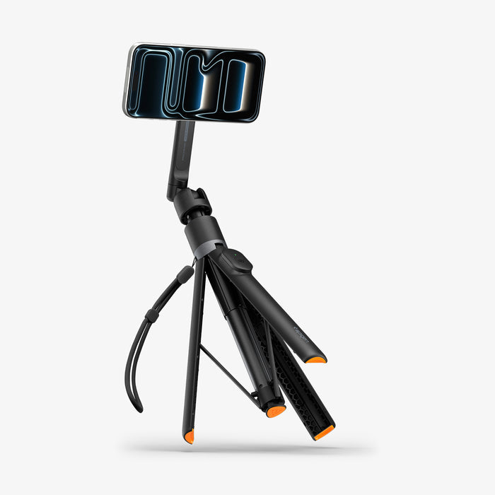 AMP11372 - Selfie Stick | S582W in Black showing a tripod mode with angled legs, mounted smartphone, and wrist strap for stable hands-free shooting.