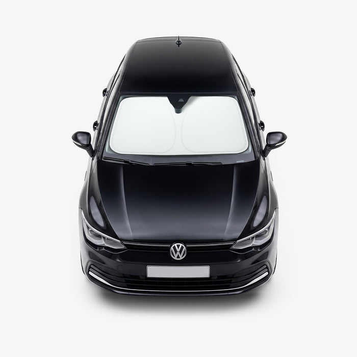 ACP11459 - Universal CryoShade UO260 S showing sunshade installed inside windshield of black volkswagen sedan viewed from front exterior