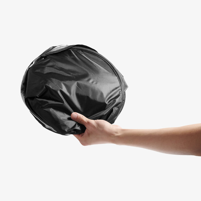 ACP11459 - Universal CryoShade UO260 S showing sunshade collapsed into small circular disc held in one hand